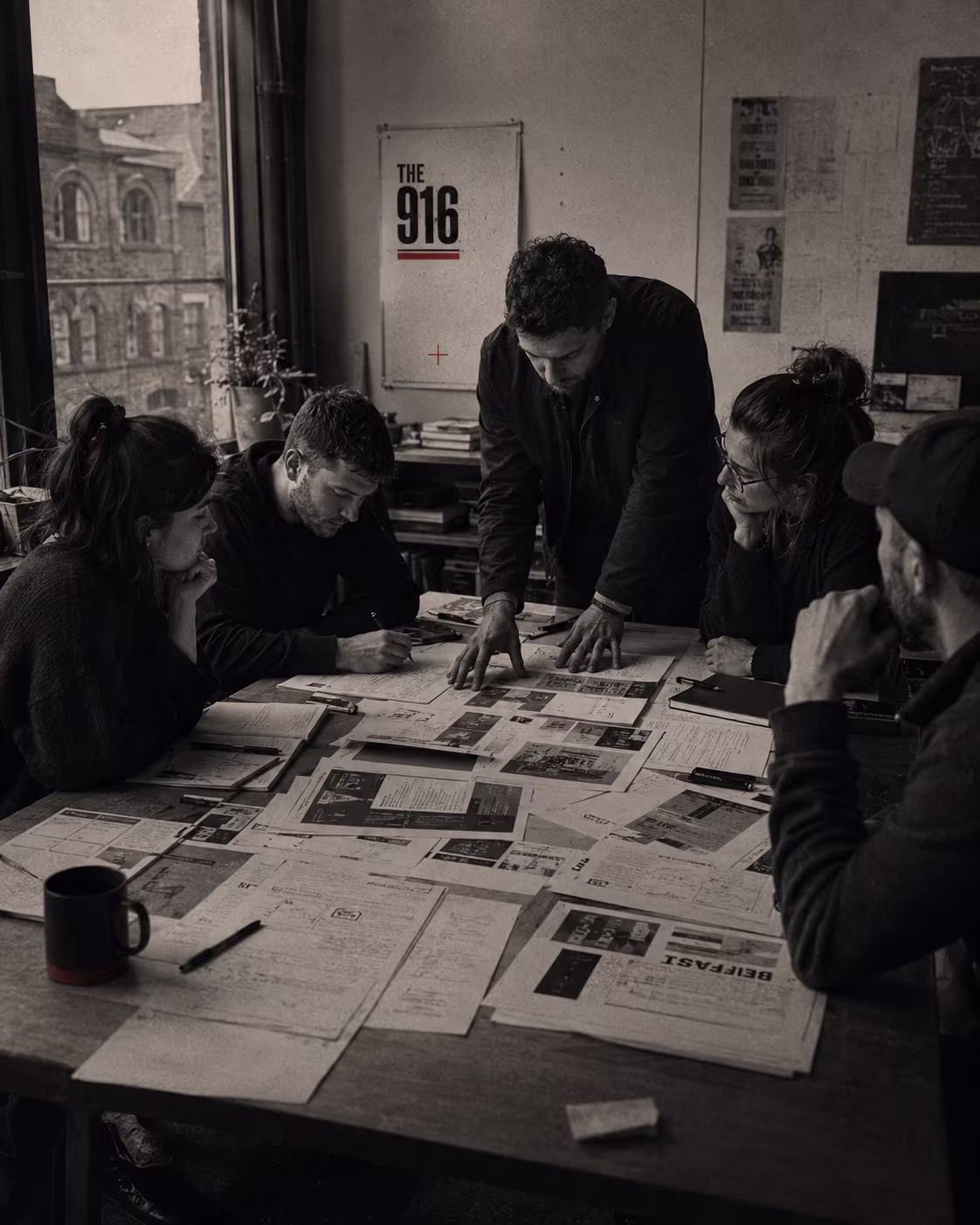 Creators shaping and reviewing work together in a contemporary studio.